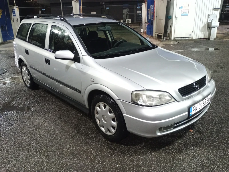 Opel Astra Комби, снимка 1 - Автомобили и джипове - 48196619