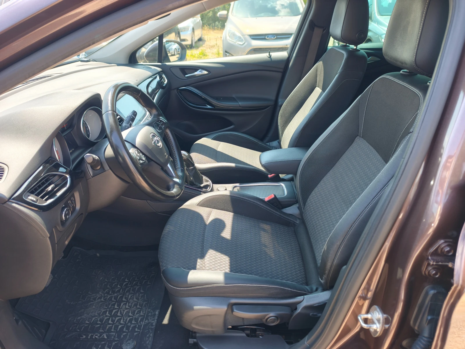 Opel Astra КАТО НОВА, снимка 11 - Автомобили и джипове - 55563062