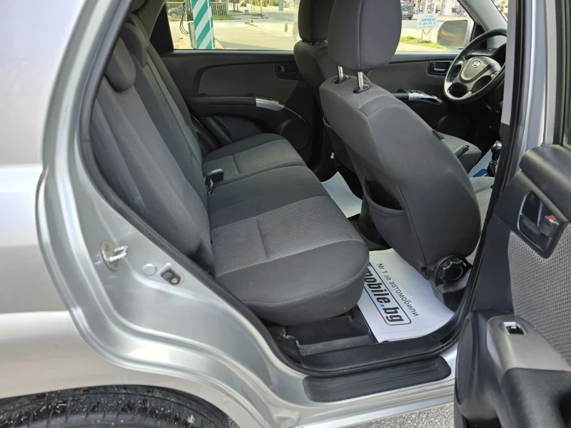 Kia Sportage 2.0 GPL, снимка 12 - Автомобили и джипове - 52482537