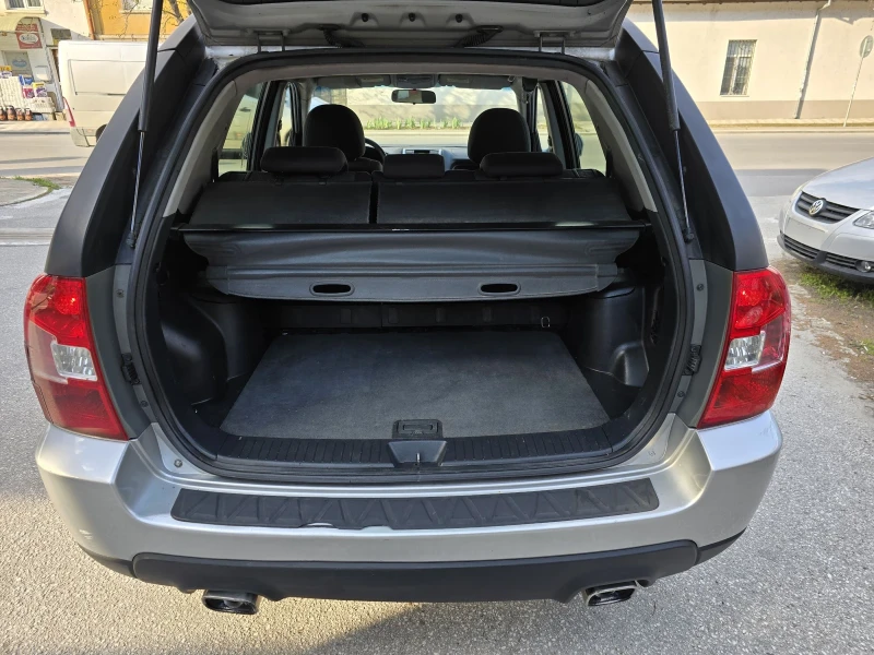 Kia Sportage 2.0 GPL, снимка 13 - Автомобили и джипове - 52482537