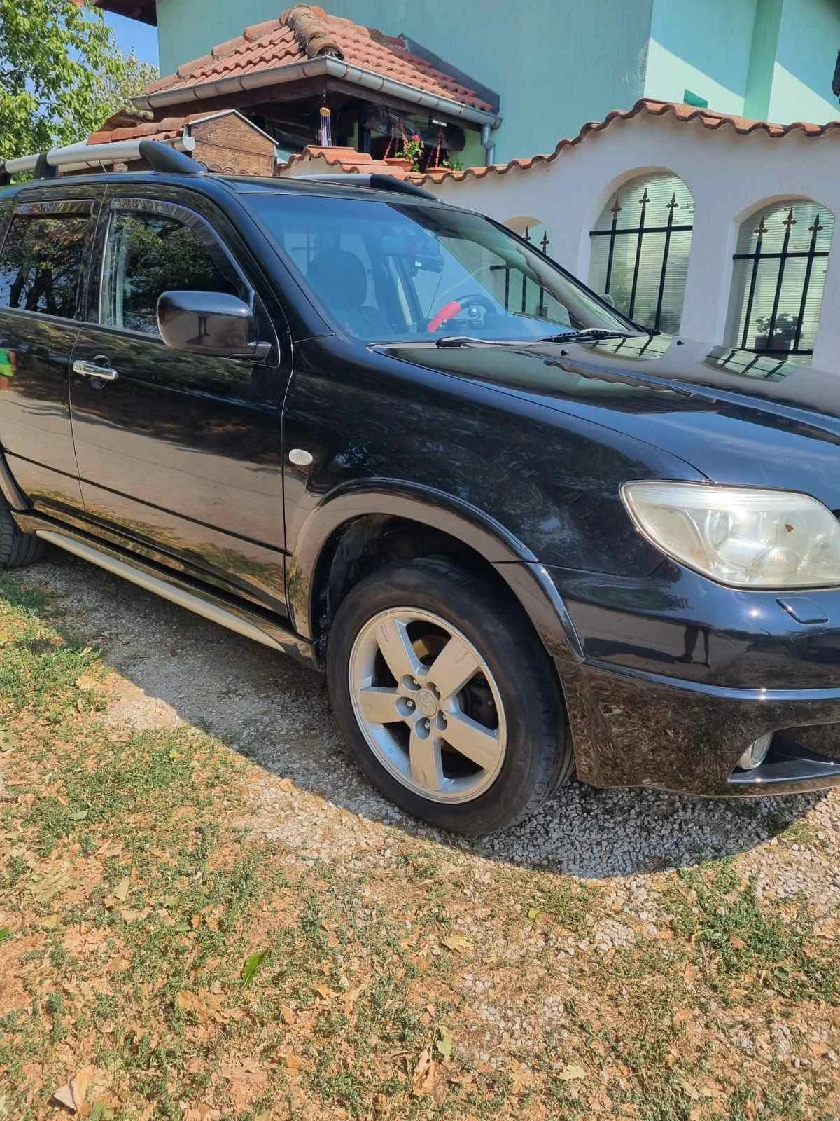 Mitsubishi Outlander, снимка 15 - Автомобили и джипове - 56252147