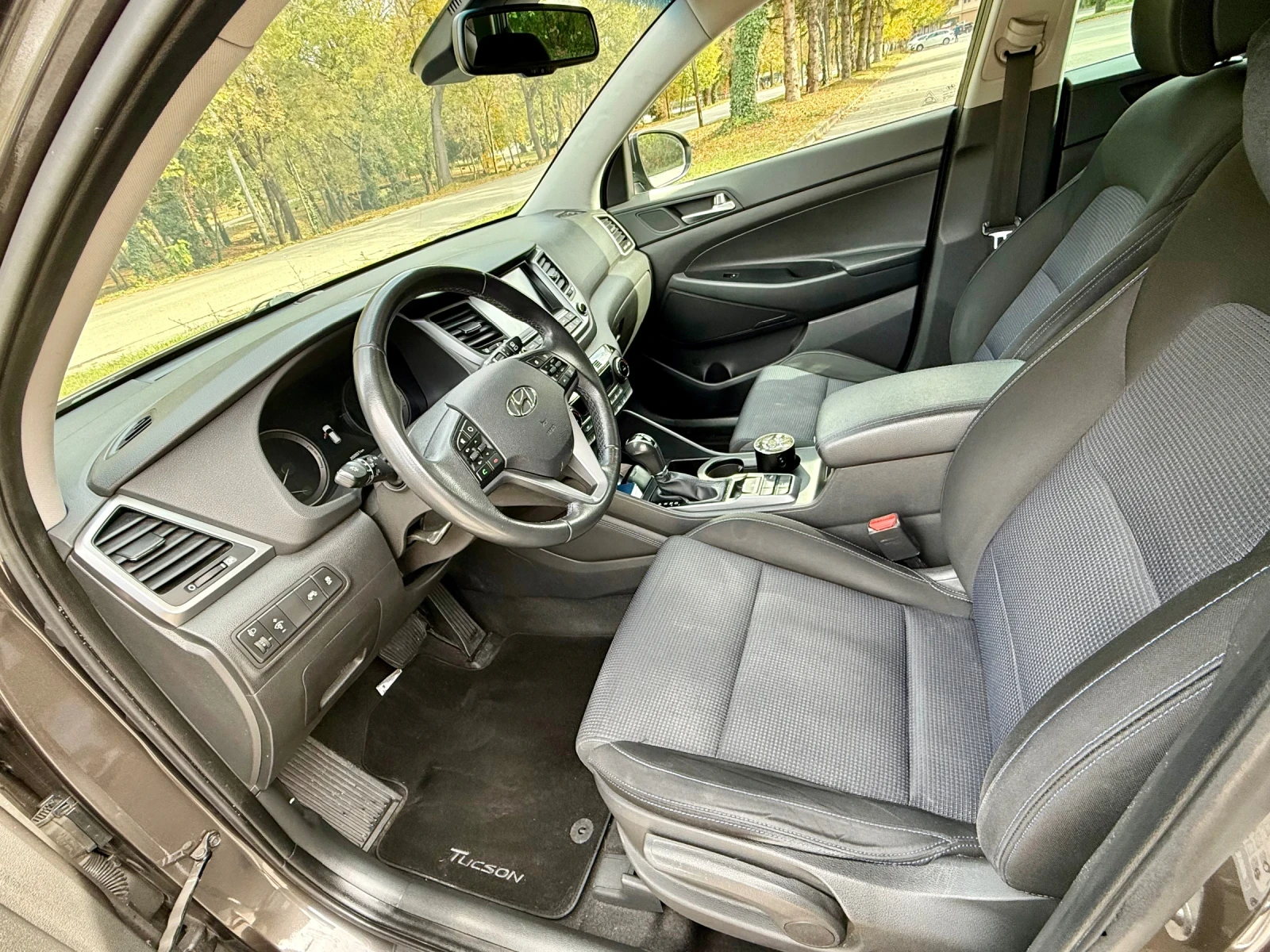 Hyundai Tucson 2.0 CRDI 4WD, снимка 12 - Автомобили и джипове - 56679714