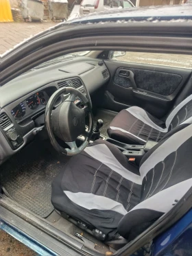 Nissan Primera P11 1.6 90к.с., снимка 10