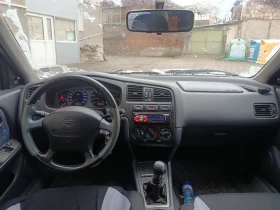 Nissan Primera P11 1.6 90к.с., снимка 11