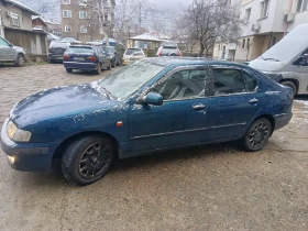 Nissan Primera P11 1.6 90к.с. - изображение 1