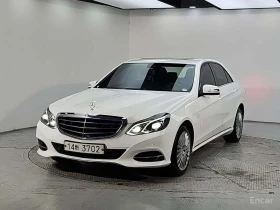 ������ Mercedes-Benz E 200