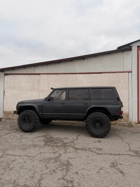 Nissan Patrol M-57  - 14500 € / 28359.53 лв. - 64541863 10