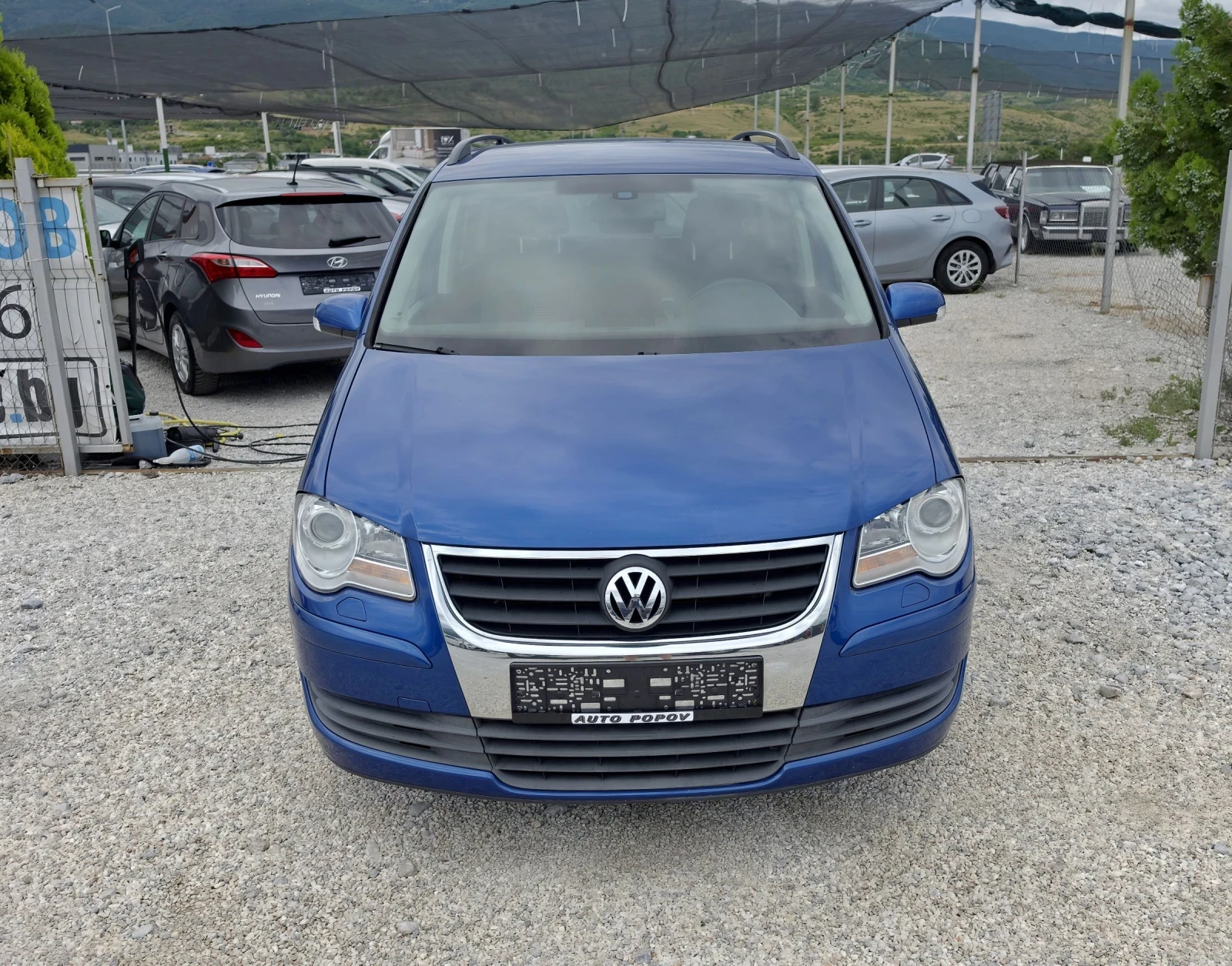 VW Touran 1.9TDI.7местен.Нави. highline, снимка 2 - Автомобили и джипове - 54884617