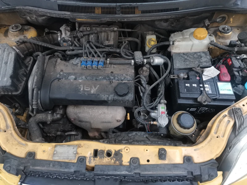 Chevrolet Aveo, снимка 14 - Автомобили и джипове - 52296686