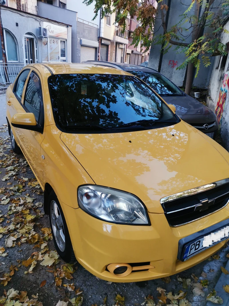 Chevrolet Aveo, снимка 9 - Автомобили и джипове - 52296686