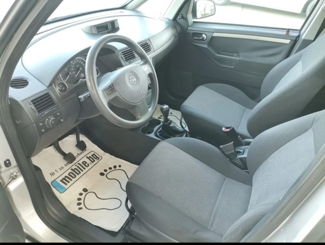 Opel Meriva 1.6 87кс стария мотор  - изображение 9
