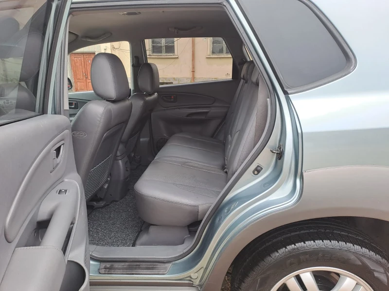 Hyundai Tucson 2.7, снимка 10 - Автомобили и джипове - 52439410