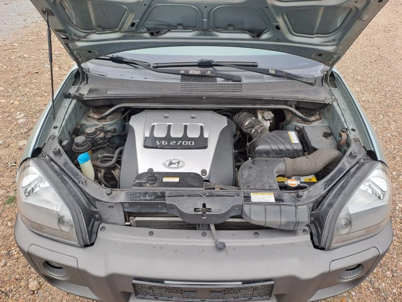 Hyundai Tucson 2.7, снимка 15 - Автомобили и джипове - 52439410