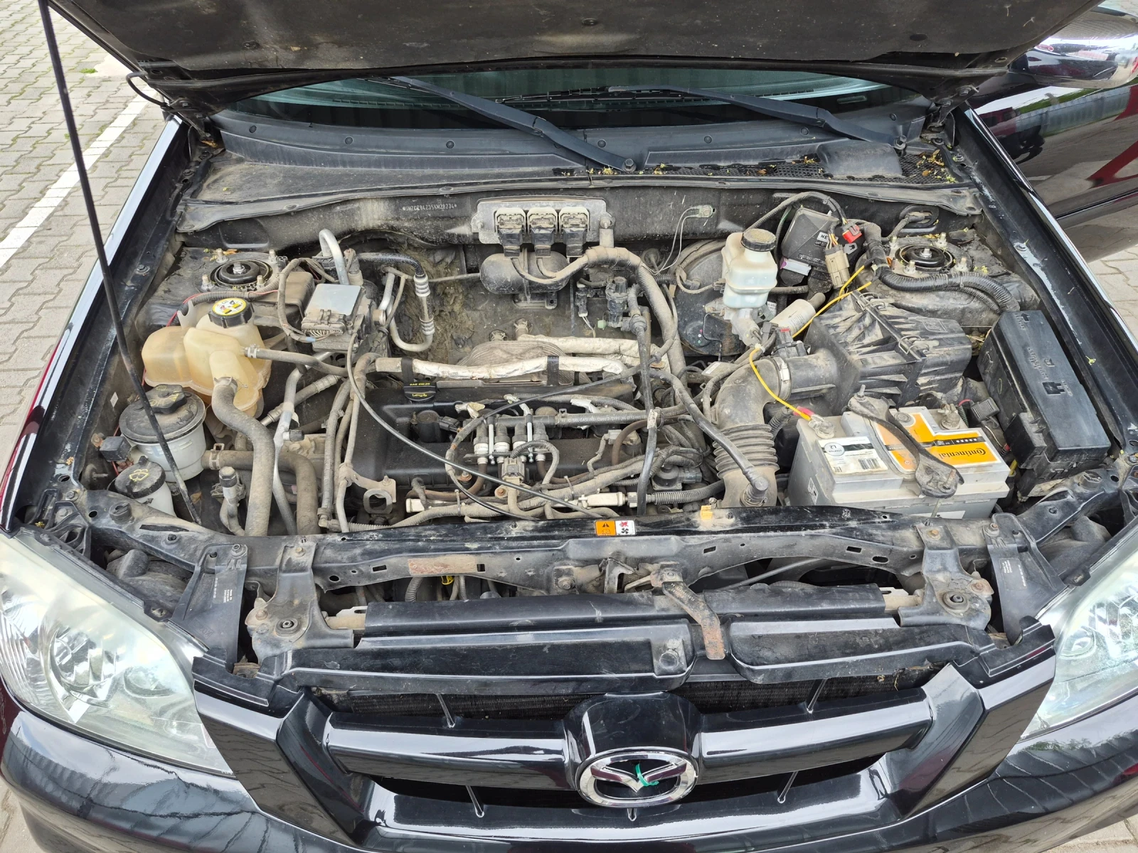 Mazda Tribute, снимка 8 - Автомобили и джипове - 55395292