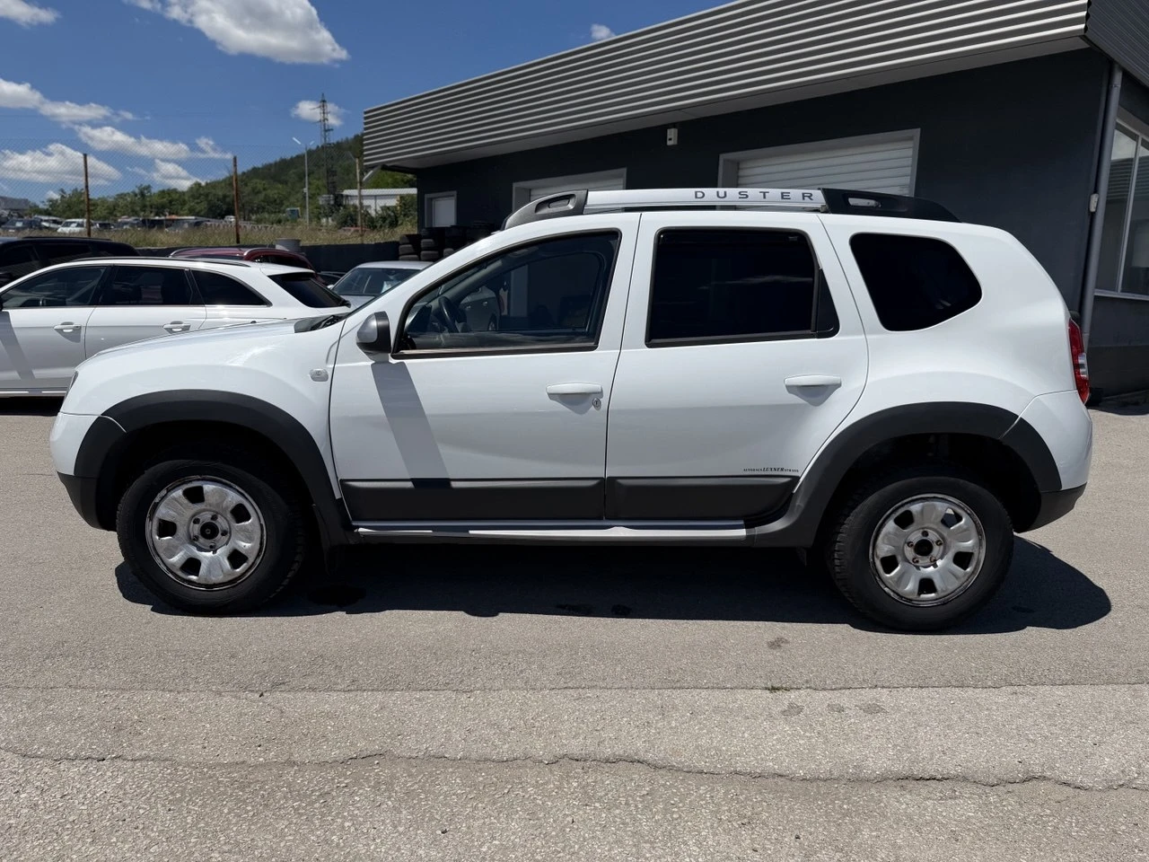 Dacia Duster 1.5dCi 4x4 NAVI, снимка 8 - Автомобили и джипове - 54903629