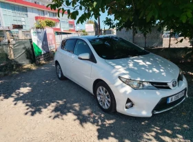 Toyota Auris 1.8i Hybrid/Panorama/Camera/Бяла Перла - 19500 лв. - 79358173 3