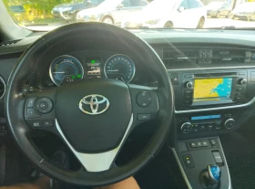 Toyota Auris 1.8i Hybrid/Panorama/Camera/Бяла Перла - 19500 лв. - 79358173 8