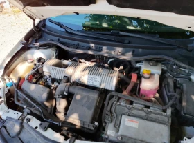 Toyota Auris 1.8i Hybrid/Panorama/Camera/Бяла Перла - 19500 лв. - 79358173 15