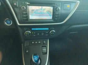 Toyota Auris 1.8i Hybrid/Panorama/Camera/Бяла Перла - 19500 лв. - 79358173 10