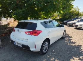 Toyota Auris 1.8i Hybrid/Panorama/Camera/Бяла Перла - 19500 лв. - 79358173 4