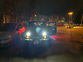 Jeep Wrangler Sport Utility , снимка 17 - Автомобили и джипове - 53456662