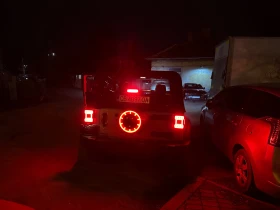 Jeep Wrangler Sport Utility , снимка 15 - Автомобили и джипове - 53456662