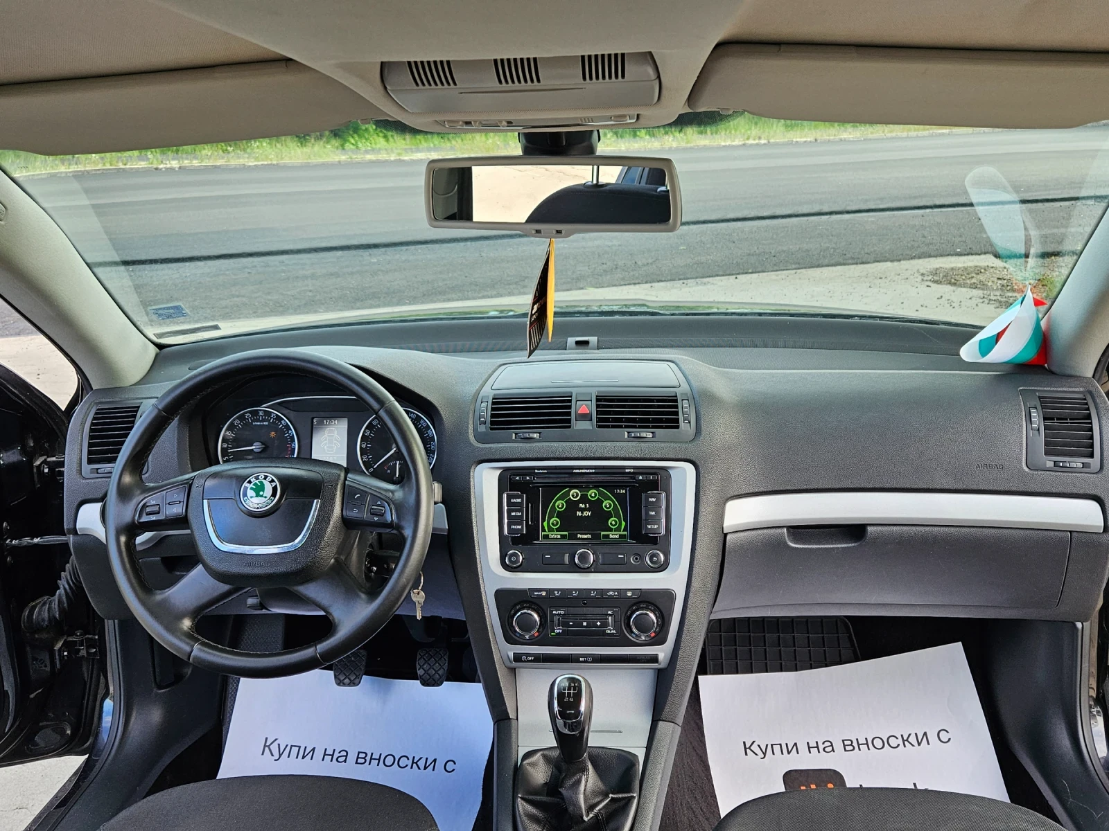 Skoda Octavia 1.6TDI* Navi* , снимка 9 - Автомобили и джипове - 54543380