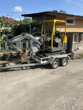Багер Volvo E15, снимка 1