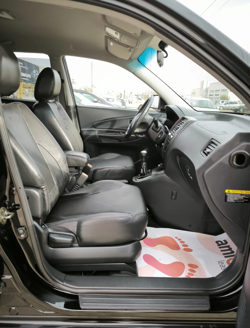 Hyundai Tucson 2.0i 16V LPG , снимка 11 - Автомобили и джипове - 49561027