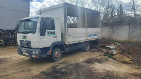 Man L, снимка 1