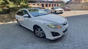 ������ Mazda 6