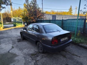 Suzuki Baleno 1.6 Газ. Инж., снимка 4