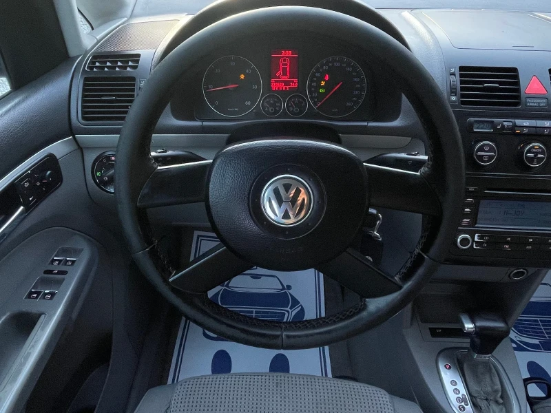 VW Touran TDI DSG, снимка 12 - Автомобили и джипове - 48007389