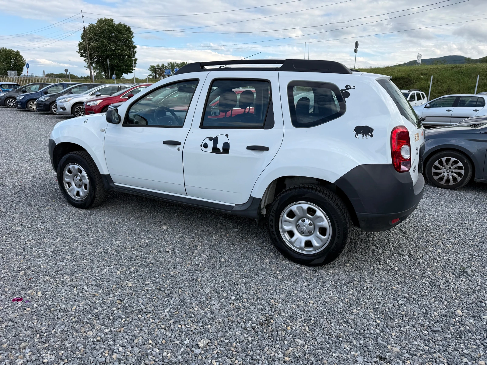 Dacia Duster 1.6 I 4×4, снимка 8 - Автомобили и джипове - 54547577
