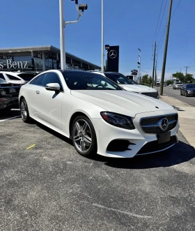������ Mercedes-Benz E 400