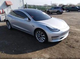 ������ Tesla Model 3