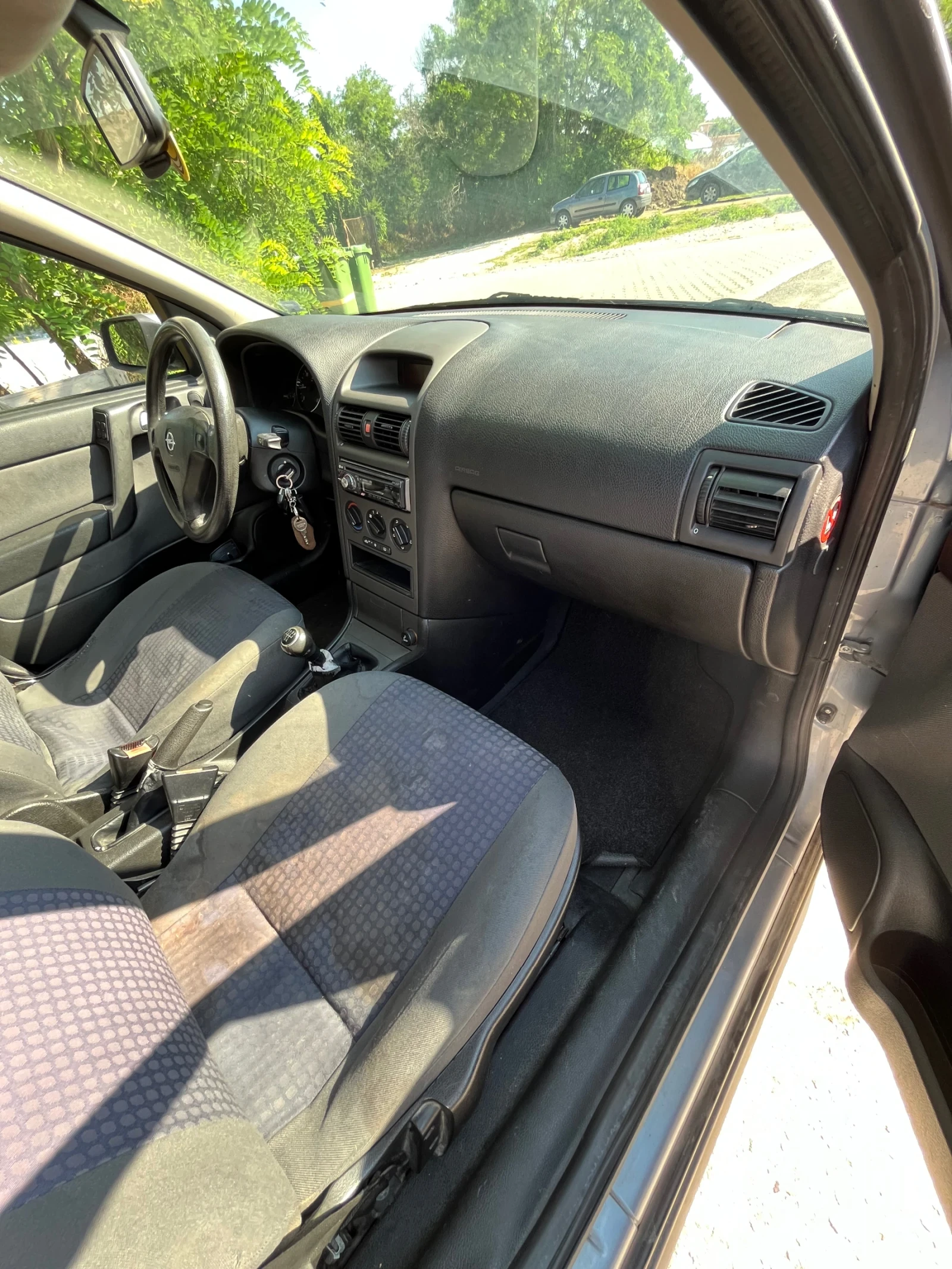 Opel Astra, снимка 11 - Автомобили и джипове - 55107522