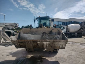 Челен товарач Komatsu WA320