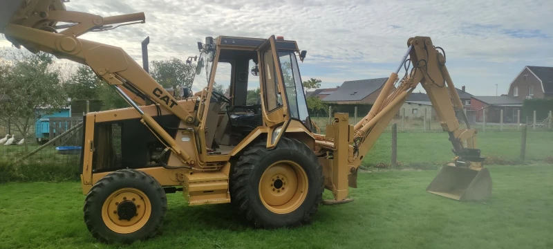 Багер Caterpillar 428