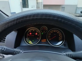 Opel Astra  H Исузу, снимка 10