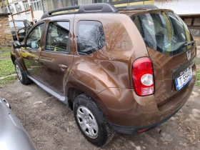 Dacia Duster 1.6 газ/бензин, снимка 1