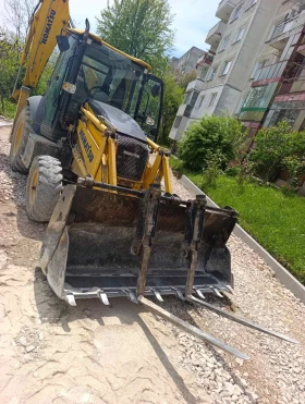 Багер Komatsu WB 93R, снимка 3