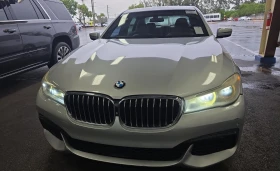 BMW 750 M-PACK* HEADUP* * SKY PANO* HARMAN* * FU | Mobile.bg    2