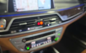 BMW 750 M-PACK* HEADUP* * SKY PANO* HARMAN* * FU | Mobile.bg    7