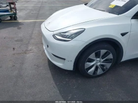 Tesla Model Y U   U All Wheel Drive - 17600 € / 34422.61 лв. - 78496054 10