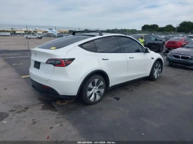 Tesla Model Y U   U All Wheel Drive - 17600 € / 34422.61 лв. - 78496054 8