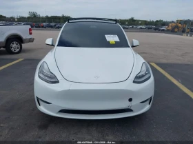 Tesla Model Y U   U All Wheel Drive - 17600 € / 34422.61 лв. - 78496054 3