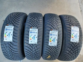 Гуми Зимни 215/65R16, снимка 1 - Гуми и джанти - 47406358