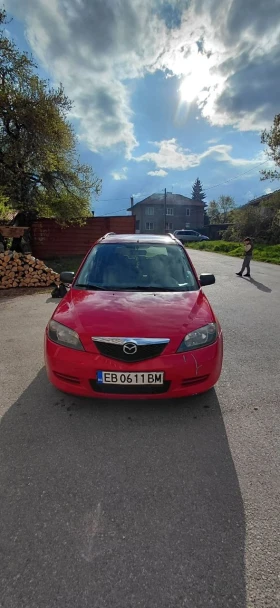 ������ Mazda 2