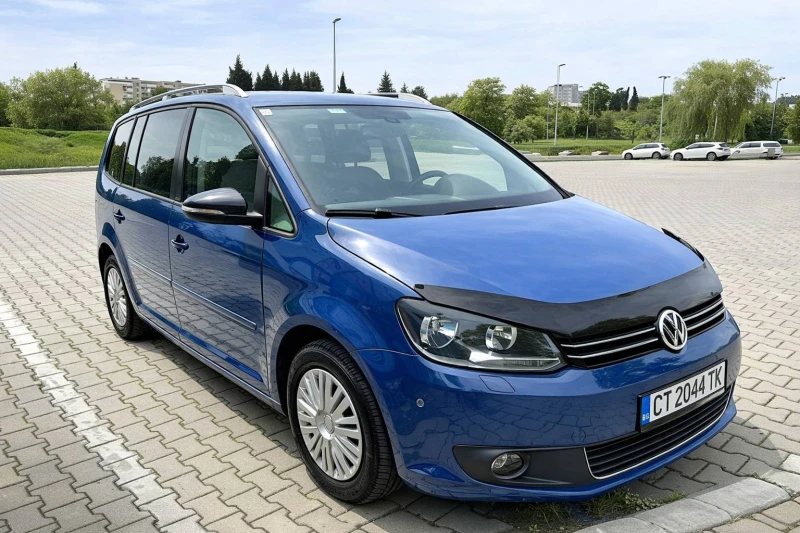 VW Touran 1.6 TDI 105 к.с. 2012 г. (DSG 7)